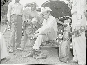 Joe Louis Putting on Golf Socks