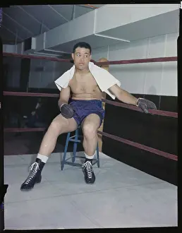 Towel Prints: Joe Louis Resting in Boxing Ring