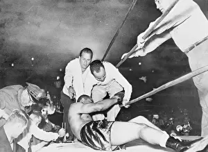 Joe Louis Scrambling in the Ring During Match