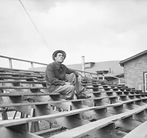 Joe Louis Seated Alone In Stands