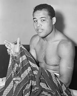 Luck Prints: Joe Louis Showing His Lucky Bathrobe