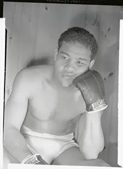Joe Louis Sitting with Gloved Hand on Cheek
