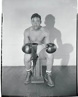 Joe Louis Sitting on Stool