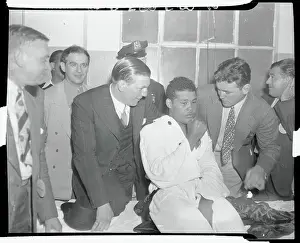 Braddock Prints: Joe Louis Speaking with Colleagues