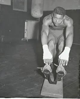 Stretching Prints: Joe Louis Stretching His Muscles