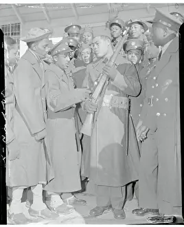 Joe Louis Surrounded by Army Buddies