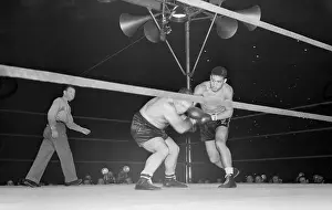 Arthur Donovan Prints: Joe Louis Throwing a Right to the Head