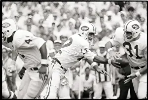 Joe Namath Hands Off To Bill Mathis