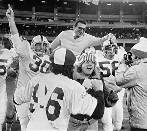 Joe Paterno Carried Off the Field