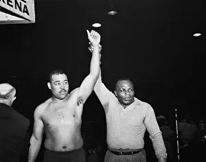 Joe Walcott Holding Up the Arm of Joe Louis