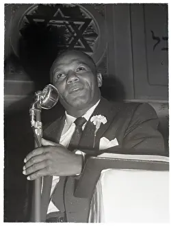 Preaching Prints: Joe Walcott Preaches Into Mic Close-Up
