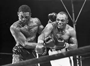 Bout Prints: Joe Walcott Punches Ezzard Charles;Fight