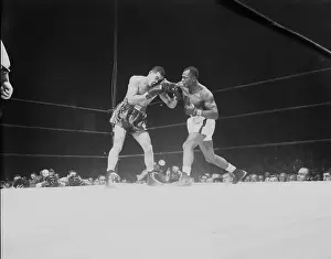 Joe Walcott Punching Joe Louis