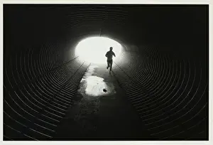 Secrecy Prints: Jogger Entering Darkened Tunnel