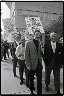 Tv Series Prints: John Astin Walks with Sign During Actors Strike