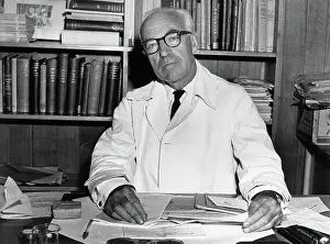John Carew Eccles Seated at Desk