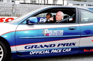Prints of UNSPECIFIED LOCATION -- CIRCA 2000: Presidential candidate John McCain (R) and his wife, Cindy McCain, at a Nascar event during his campaign, circa 2000. (Photo by David Hume Kennerly/Getty Images) Chasing Speed: Motorsport in Motion: John and Cindy McCain at a Nascar Event