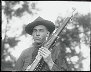 Adolescence Prints: John Coolidge Holding Rifle