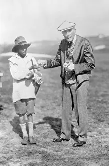 Teenage Boy Prints: John D. Rockefeller with His Caddy