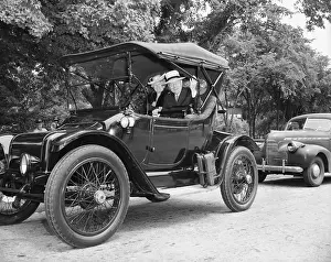John D. Rockefeller and Wife Waving