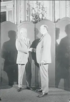 John Davis and Charles Bryan Shaking Hands