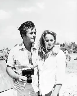 John Derek Putting his Arm Around Ursula Andress