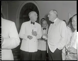 John F. Dulles with Gerald R. Issacs
