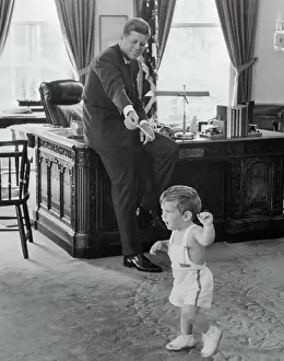 John F. Kennedy with 18 Month Old Son John Jr