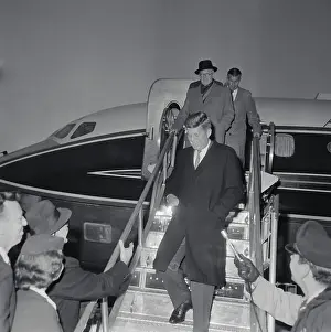 John F. Kennedy on Airplane Steps