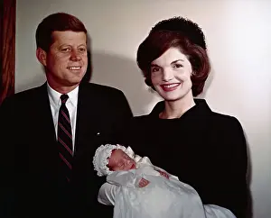 John F Kennedy with Jackie Holding Son John Jr