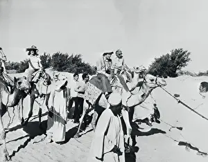 John F. Kennedy Jr. and Aristotle Onassis Riding Camels