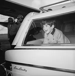 John F. Kennedy Jr. In Car