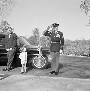 John F. Kennedy Jr. Watching Soldier as He Salutes