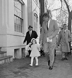 John F Kennedy Walking with Daughter Caroline