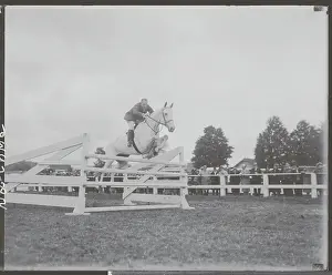 John Farrell Jumping with Horse at Show