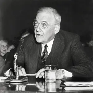 Arms Prints: John Foster Dulles Speaking Seated