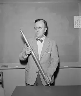 John Hagen Holding a Model Rocket