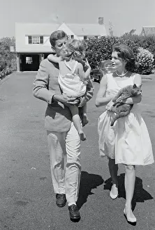 John and Jacqueline Kennedy on Outing with Their Daughter