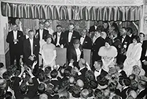 John Kennedy Greeting Guests
