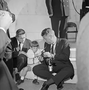 John Kennedy Jr. Talking with Photographer