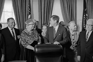 John Kennedy Standing with Others