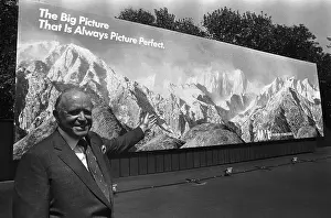 John Kluge Gesturing to Mural