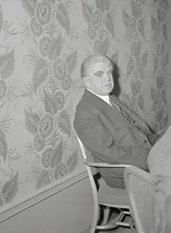 John L Prints: John L. Lewis Sitting Against Wall