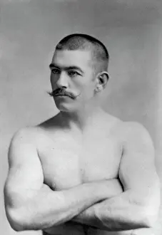 Prints of Portrait of the boxer John Lawrence Sullivan (1858 - 1918), heavyweight boxing champion, with arms folded across his chest, late nineteenth century. (Photo by Interim Archives/Getty Images) In the Ring: The Art of Boxing: John L. Sullivan