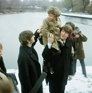 John Lennon Carrying a Girl