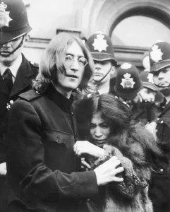 Police Helmet Prints: John Lennon and Yoko Ono After Drug Hearing