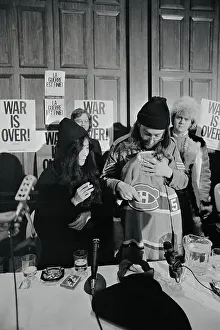 John Lennon and Yoko Ono Receiving Gift