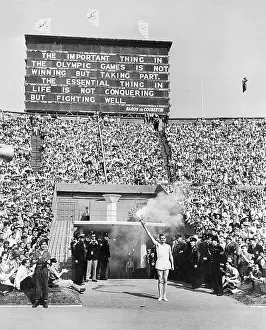 Spectators Prints: John Mark with Olympic Fire