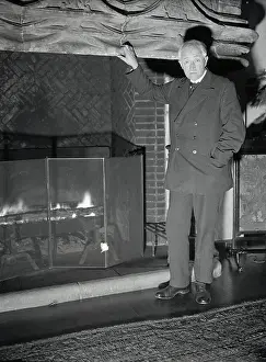 George Vi Prints: John Masefield Posing by Fireplace