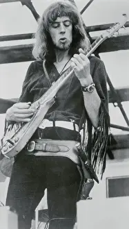 John Mayall Playing a Guitar
